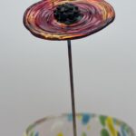 Fleur en verre rouge transparent