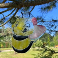 Attrape-soleil en verre fusionné Attrape-soleil en verre fusionné